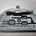 Oem 2000 2004 Nissan Xterra Spare Tire Jack Tool Kit W/ Roof Rack Used. Price: $100.00.