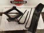 Spare Tire Jack & Tool Kit From 2003 Escape 9489433 Used. Price: $82.77.