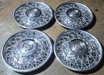 Set Of 4 1975-85 Cadillac Fleetwood Brougham 15" Wire Spoke Hubcaps Wheel Covers Used. Price: $249.99.