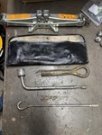 2003-2006 Infiniti G35 Roadside Spare Tire Tool Kit And Jack Used. Price: $79.00.